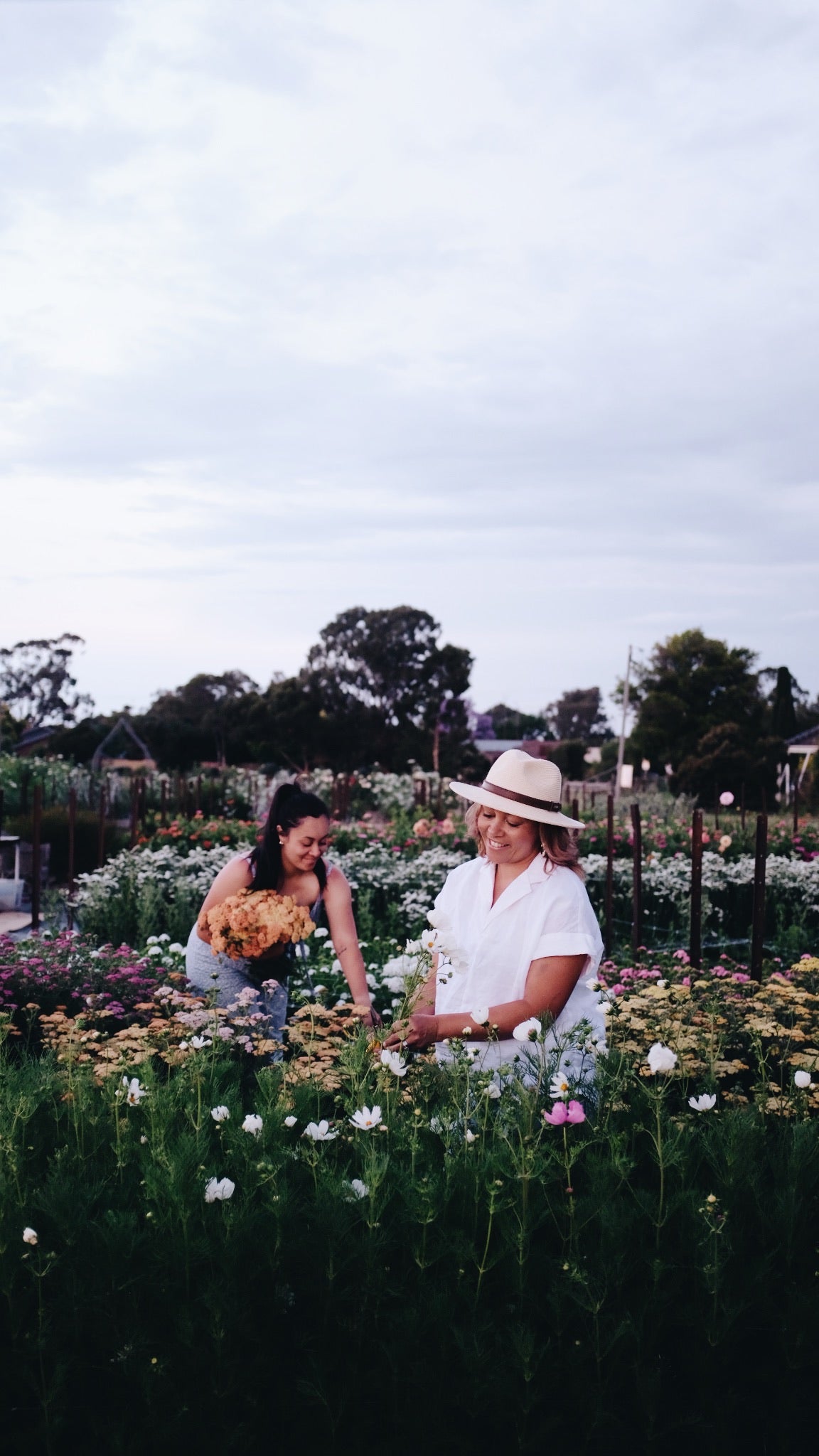 Picking spring blooms together in the patch at Wrens Flower Farm